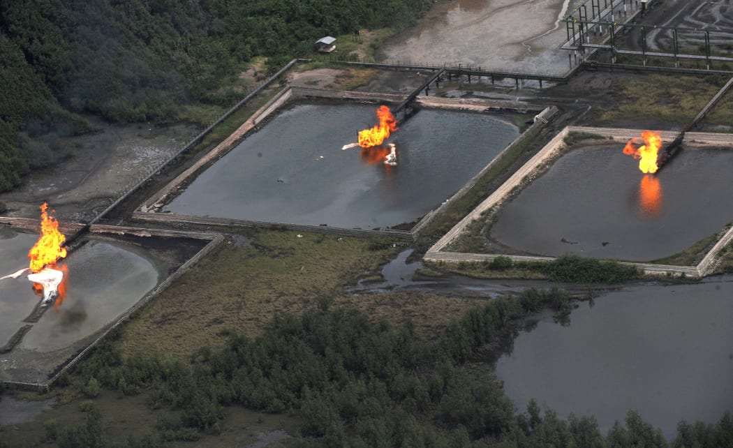 A picture taken in March 2013 shows gas flare at Shell Cawtharine Channel in Nembe Creek in the Niger Delta.