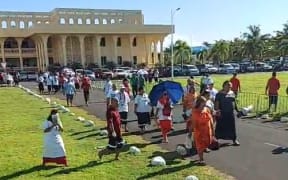 Crowds outside Samoa's Supreme Court head to parliament, where the Speaker has refused to convene the house amid a constitutional crisis, 24 May 2021.
