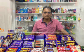 Sandip Patel was hospitalised after an attack on his Hamilton East dairy in 2018.