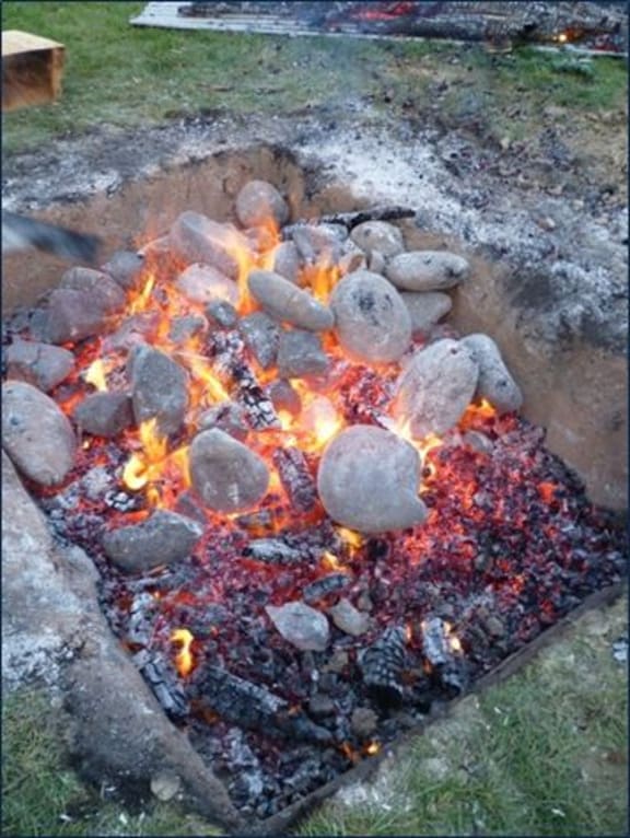Red-hot earth oven.