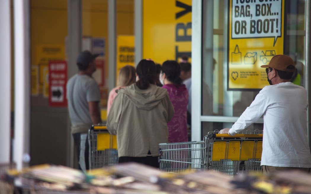 Queues at Mt Wellington supermarkets after it was announced the country is moving into alert level 3 and then 4 in the next few days.