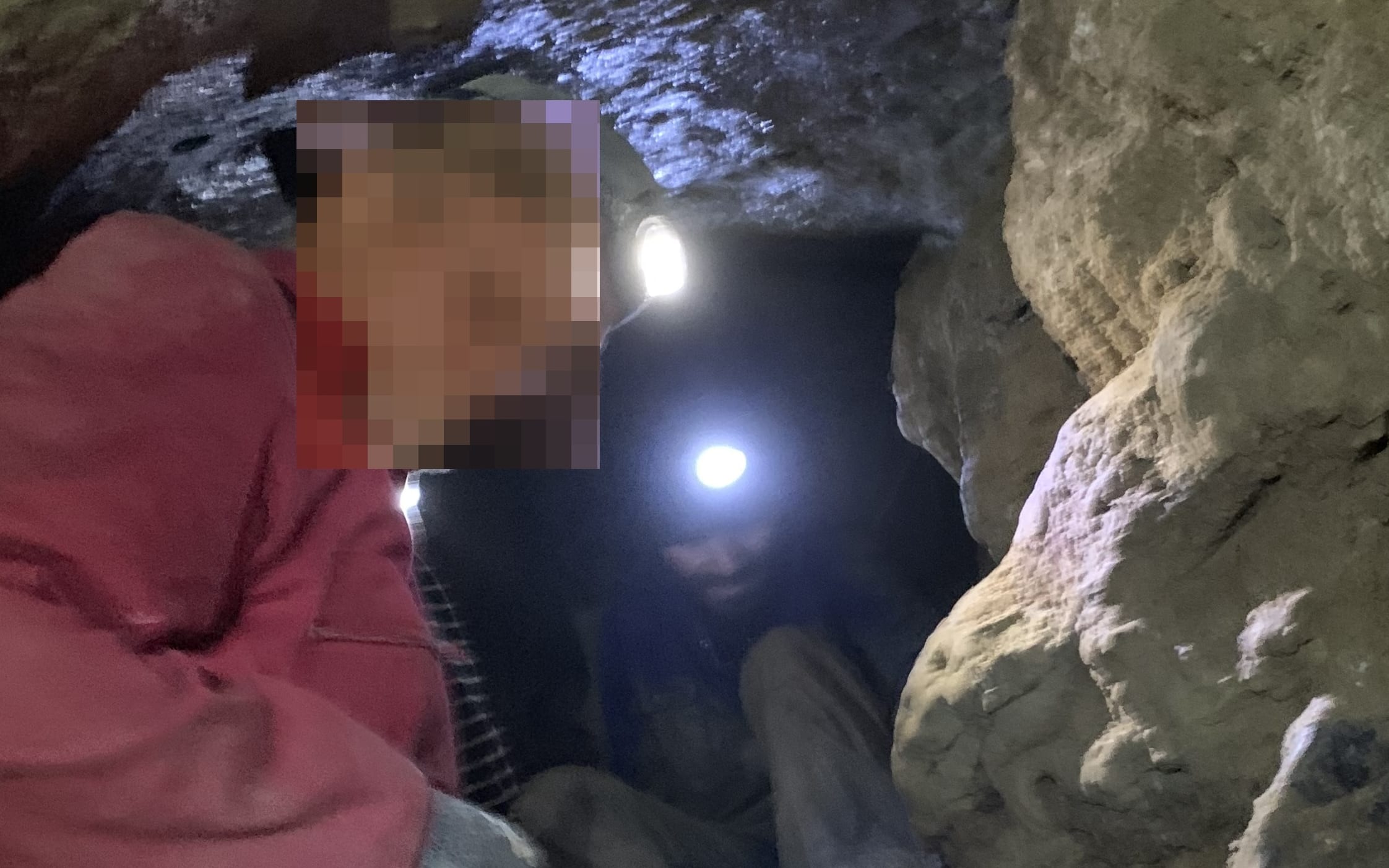 Men in the 'secret' cave - Waikaretu Valley