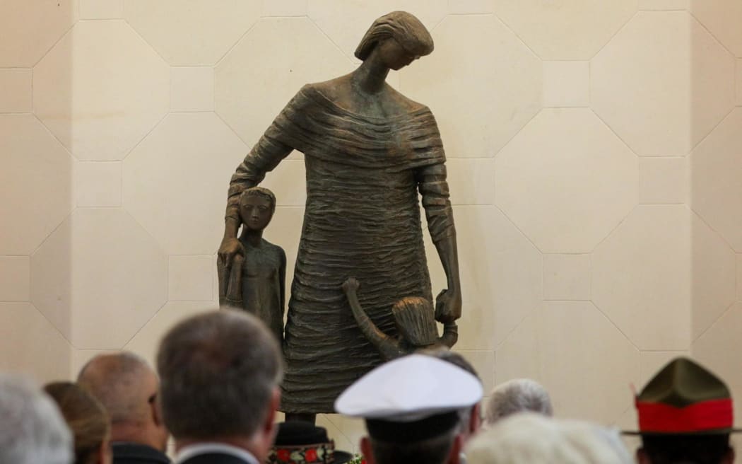 A private Anzac ceremony is held at the Hall of Memories at Pukeahu after a larger public ceremony was cancelled due to high winds.