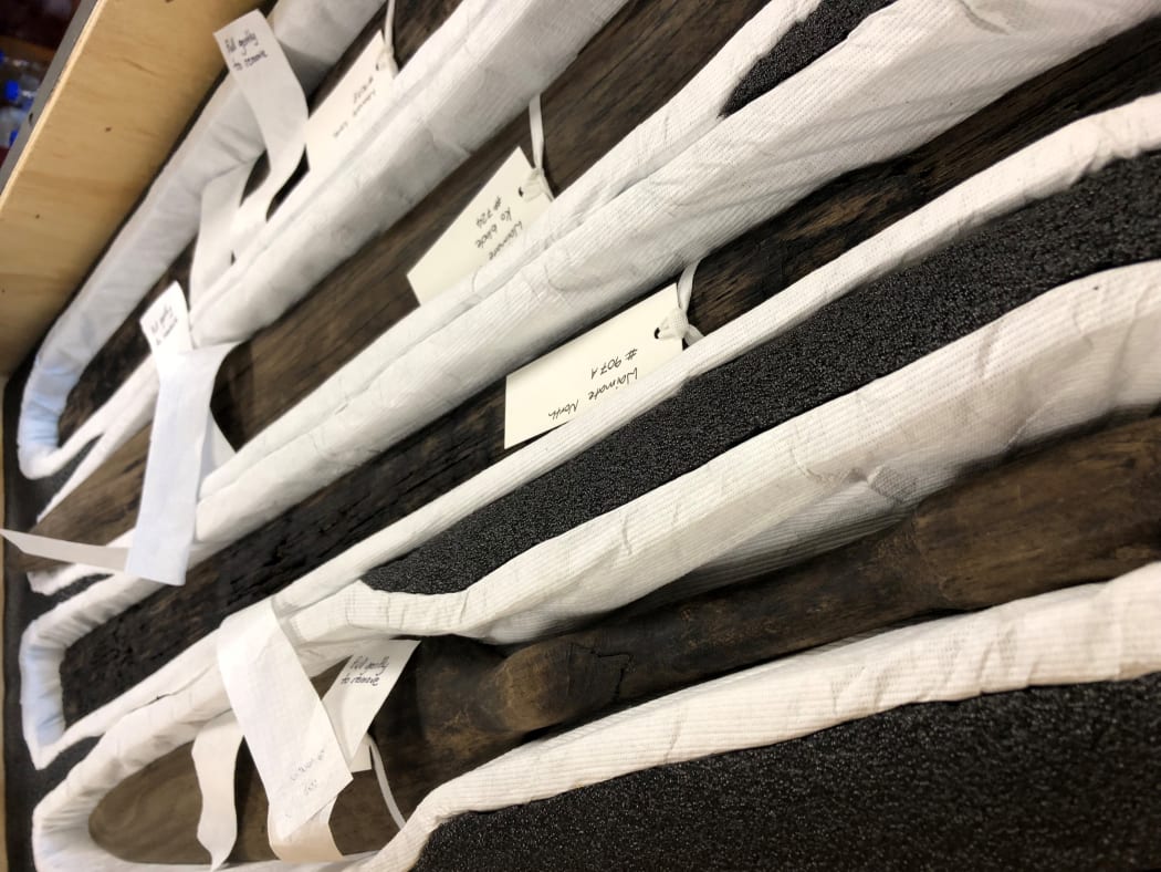 An image of some of the taonga to be returned, laid in cloth wrapping.