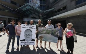 The protestors want Evan C. Williams to stand down from his position as chair of Te Papa museum.