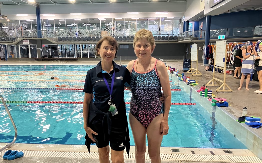 Swim coach Sue Pilkington (left) with long-time swimmer Maria Sunde, who credits the workouts for having a huge effect on her health.