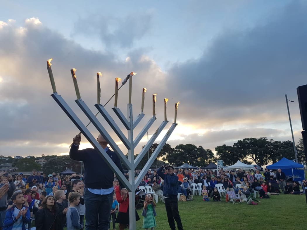 Lighting the Channukiah/Menorah at Okahu Bay, Auckland during Hanukkah