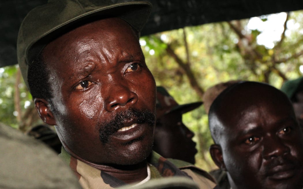 (FILES) The leader of the Lord's Resistance Army, Joseph Kony answers journalists' questions on November 12, 2006 at Ri-Kwamba in Southern Sudan following a meeting with UN humanitarian chief Jan Egeland. The International Criminal Court will from September 9, 2025 hear war crimes charges against the fugitive Ugandan warlord Joseph Kony, accused of spearheading a brutal reign of terror that killed and abducted tens of thousands.
The "night commuters", one of the emblematic features of the horrific insurgency that raged for years, were children who trekked through each dark night to stay in towns or shelters where they hoped they were less at risk of being kidnapped by Kony's army. (Photo by STUART PRICE / POOL / AFP)