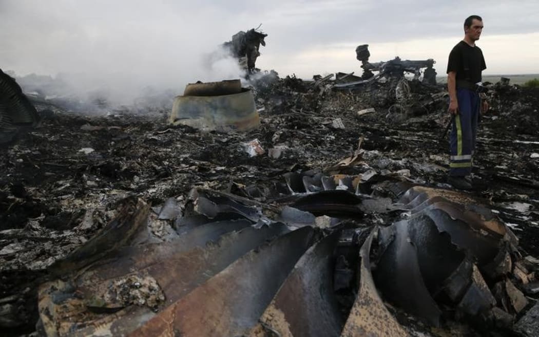 An emergency worker at the crash site near the settlement of Grabovo in the Donetsk region.