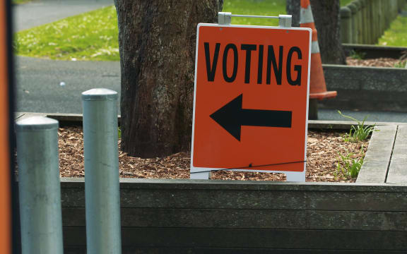 An orange voting sign.