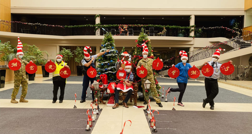 Staff at MIQ in Rotorua's Rydges spread the festive cheer.