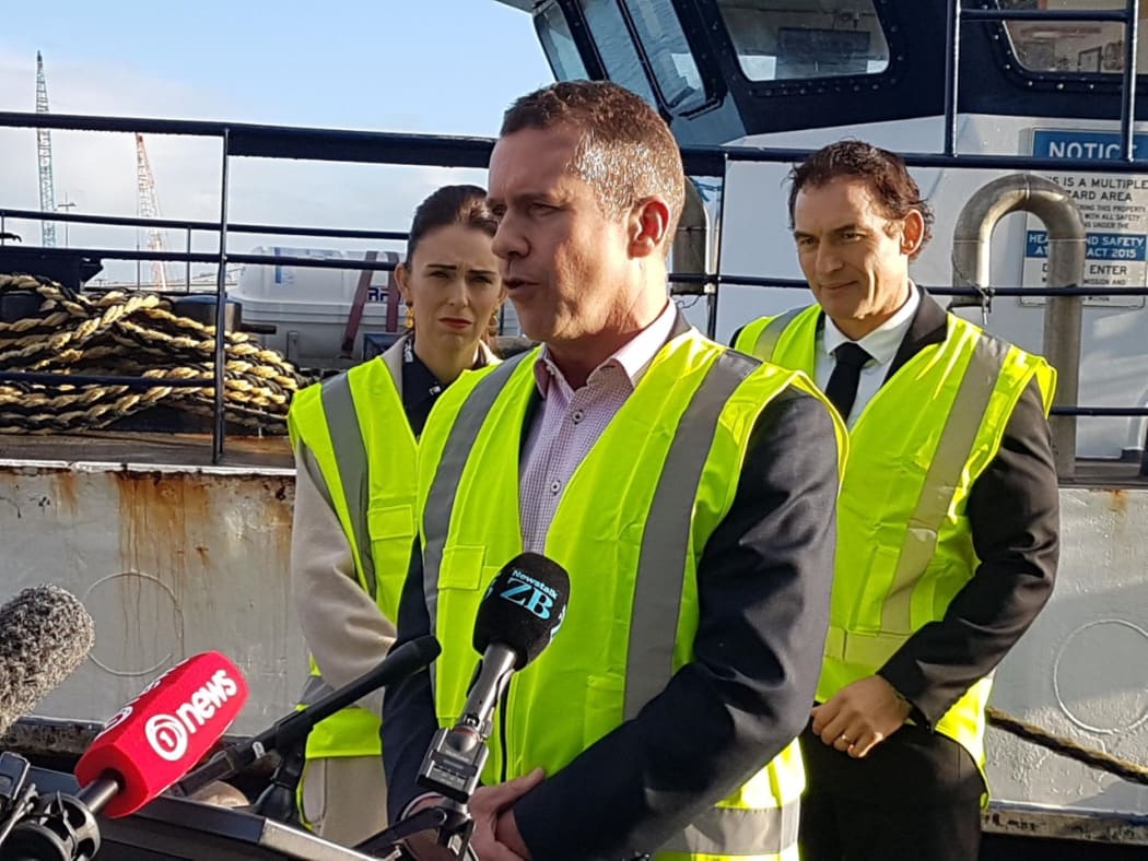 Sanford chief executive Volker Kuntzsch speaking at the announcement on cameras on fishing boats by PM Jacinda Ardern, left, and Fisheries Minister Stuart Nash, right.