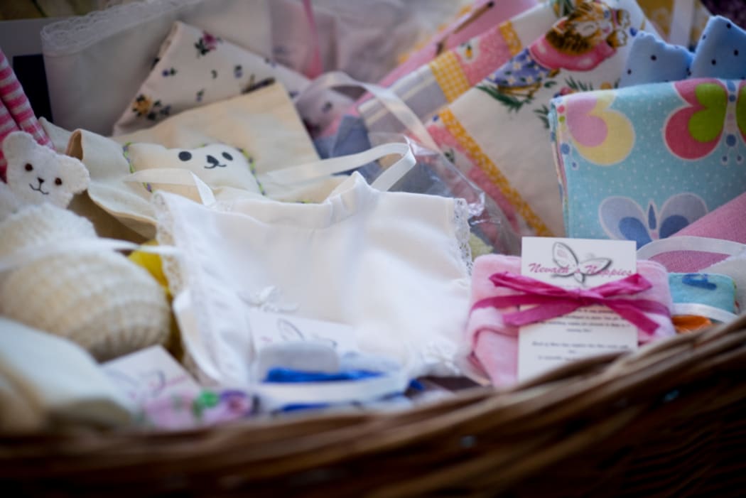 A welcoming basket in the Pohutukawa Room  is filled with an assortment of handmade goods.