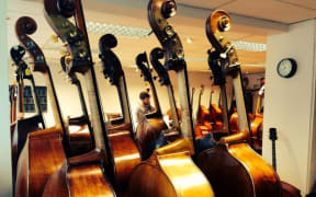 2016 Patricia Pratt Scholarship winner Alex Verster choosing a bass for his music school audition at Thwaites Fine Stringed Instruments in London