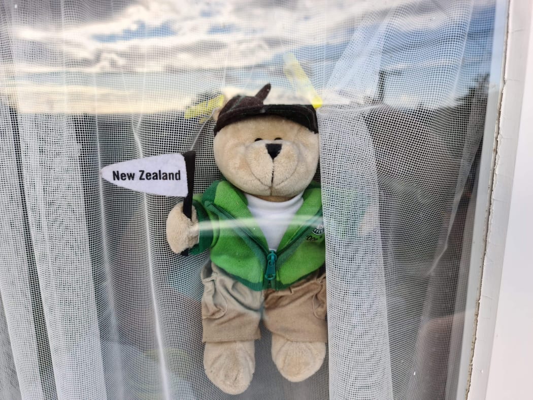 Teddy bear in window to cheer up kids in neighbourhood during Covid-19 lockdown