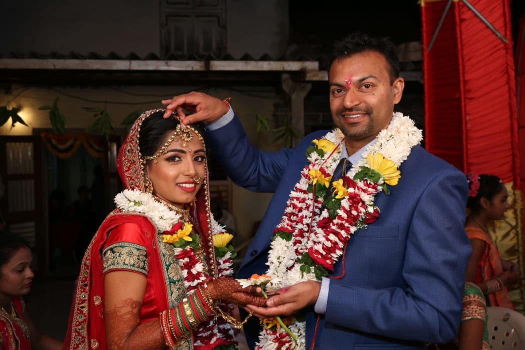 Sandeep Gosai, right, and his wife Divyaben.