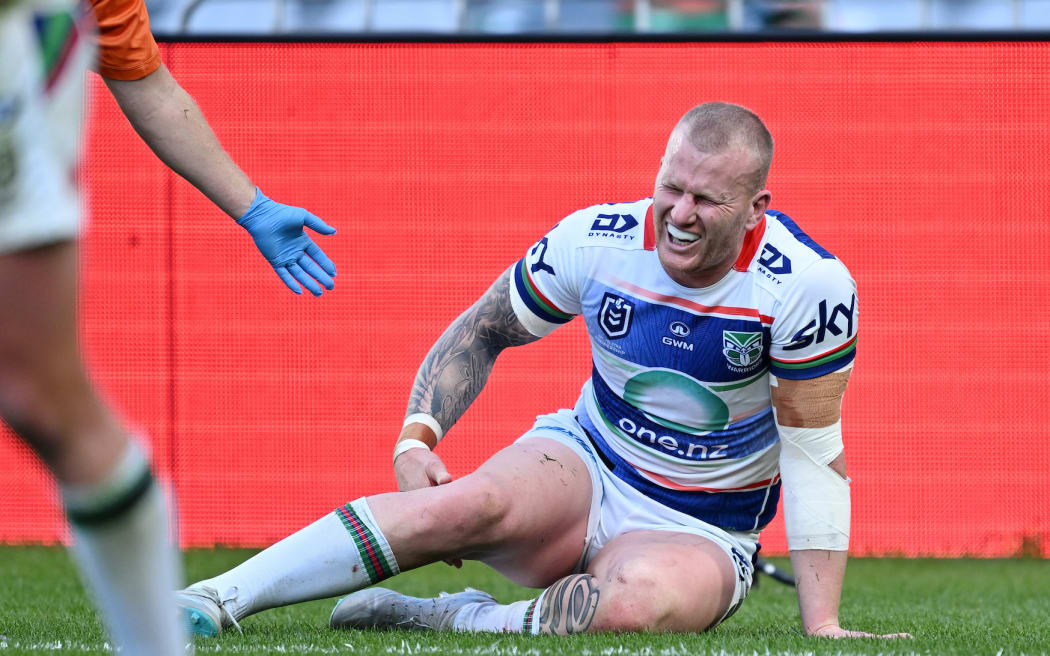 Mitchell Barnett of the Warriors down injured, South Sydney Rabbitohs v NZ Warriors.