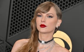 US singer-songwriter Taylor Swift arrives for the 66th Annual Grammy Awards at the Crypto.com Arena in Los Angeles on February 4, 2024. (Photo by Robyn BECK / AFP)