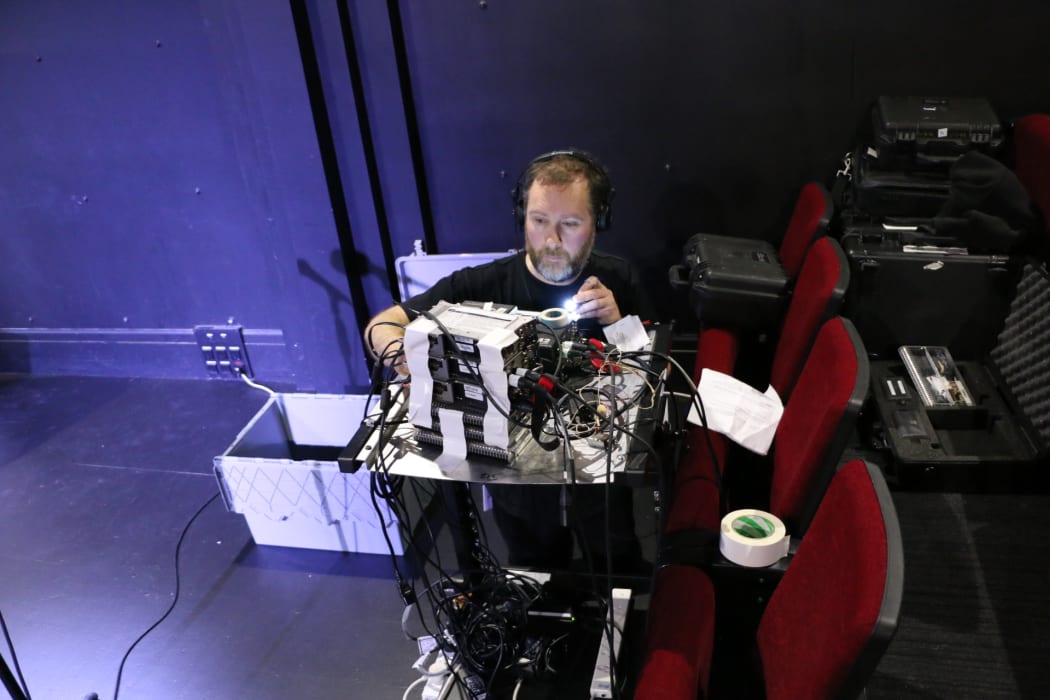 Engineer Marc Chesterman sets up his sound gear to record "Vanilla Miraka" at BATS Theatre