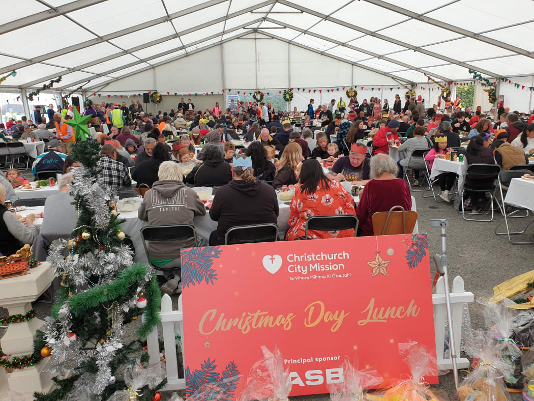 Christchurch's City Mission Christmas lunch turnout had less people than expected, after rain poured down.