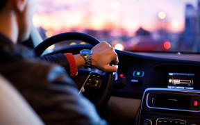 man in car