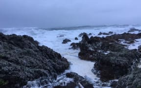 Strong waves barrage the coast at Houghton Bay in Wellington.