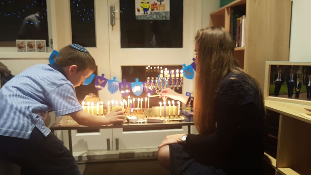 Deb Levy - Lighting as a family at home for Hanukkah