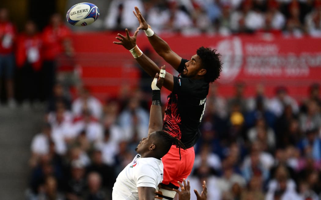 Fiji's lock Isoa Nasilasila (R) and England's lock Maro Itoje (L) jump for the ball in a line out during the France 2023 Rugby World Cup quarter-final match between England and Fiji at the Velodrome Stadium in Marseille, southeastern France, on October 15, 2023.