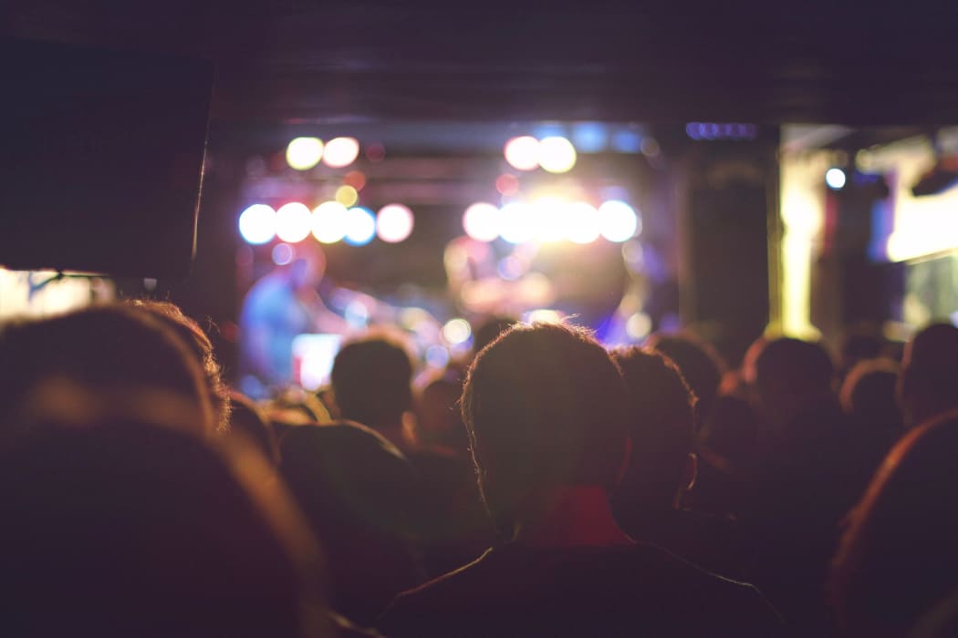 Audience watching live music.