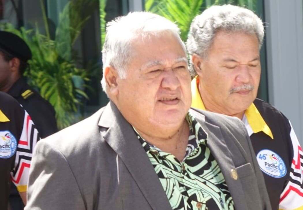 Samoa's Prime Minister, Tuilaepa Sailele Malielegaoi. In the background is Tuvalu's Prime Minister Enele Sopoaga