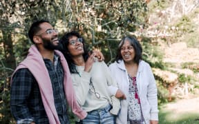 (L-R) Navin, Anique and Sushani together at home in Tāmaki Makaurau