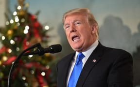 Donald Trump announces the US recognises Jerusalem as Israel's capital and will move its embassy there.