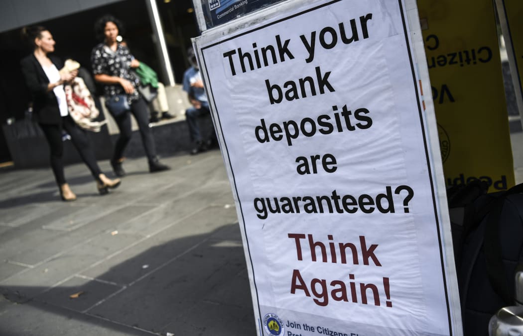 A placard outside the Australian royal commission set up in February to investigate claims of misconduct in the banking sector.