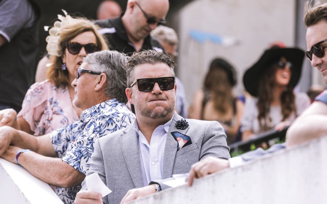 Crowds excited for New Zealand Trotting Cup at Addington Raceway in Christchurch.