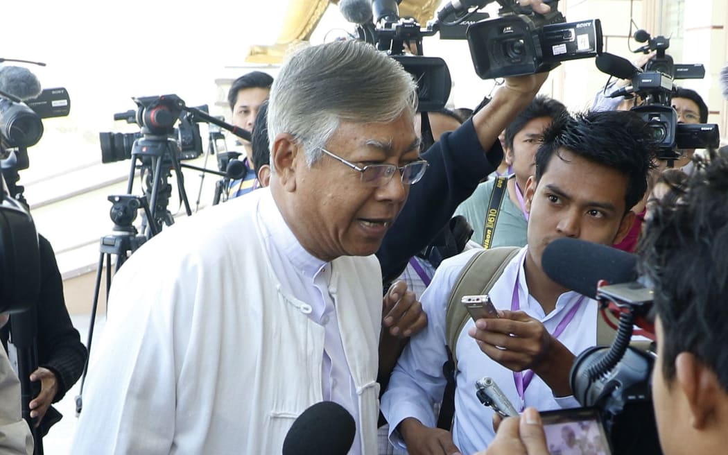 U Htin Kyaw talks with media in February at Myanmar's Lower house Parliament in the capital city of Naypyidaw.