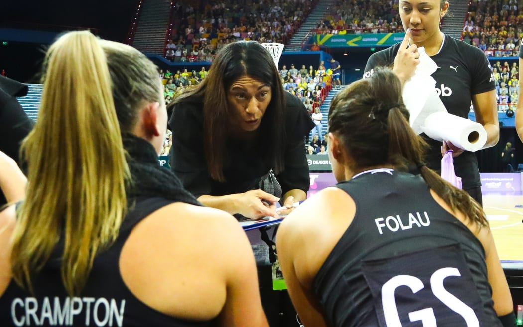 Silver Ferns coach Noeline Taurua talks tactics with her players.