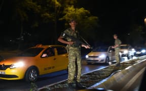 A Turkish security officer on guard in Istanbul during a security shutdown of the Bosphorus Bridge.