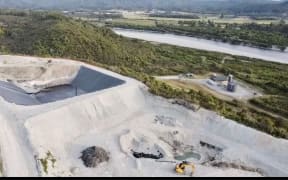 A drone-view of the Taylorville Resource Park site, with the Greymouth town water supply Coal Creek water treatment park below, right, and the Grey River in the background.