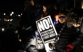 KENOSHA, WISCONSIN - NOVEMBER 19: Protesters are gathered outside the Kenosha County Courthouse after US jury found Kyle Rittenhouse not guilty in Kenosha protest shootings that killed 2 and injured a third, on November 19, 2021 in Kenosha, Wisconsin, United States.