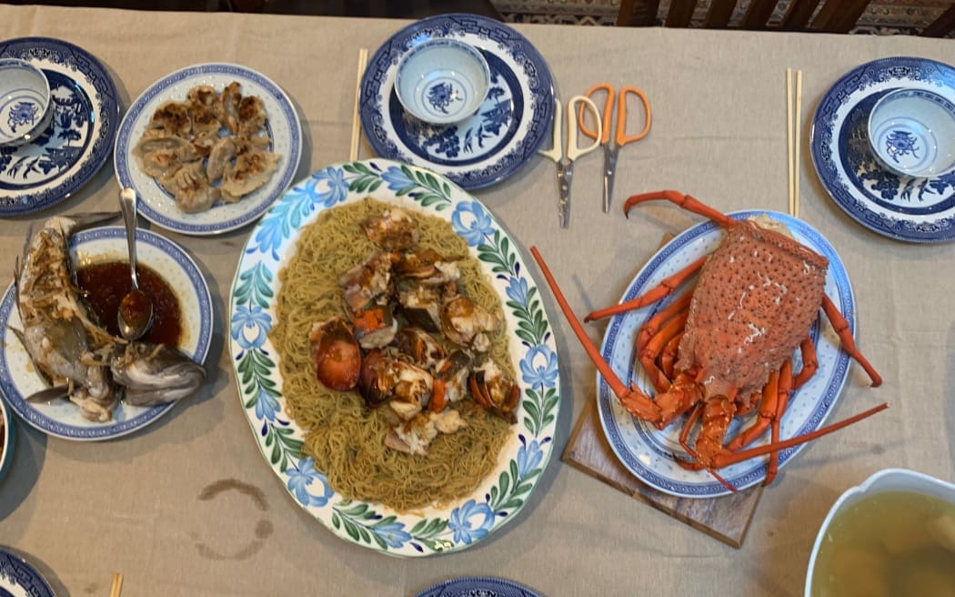 Chinese New Year Feast - whole steamed fish, crayfish, pork dumplings, life-long noodles and chicken and clam soup