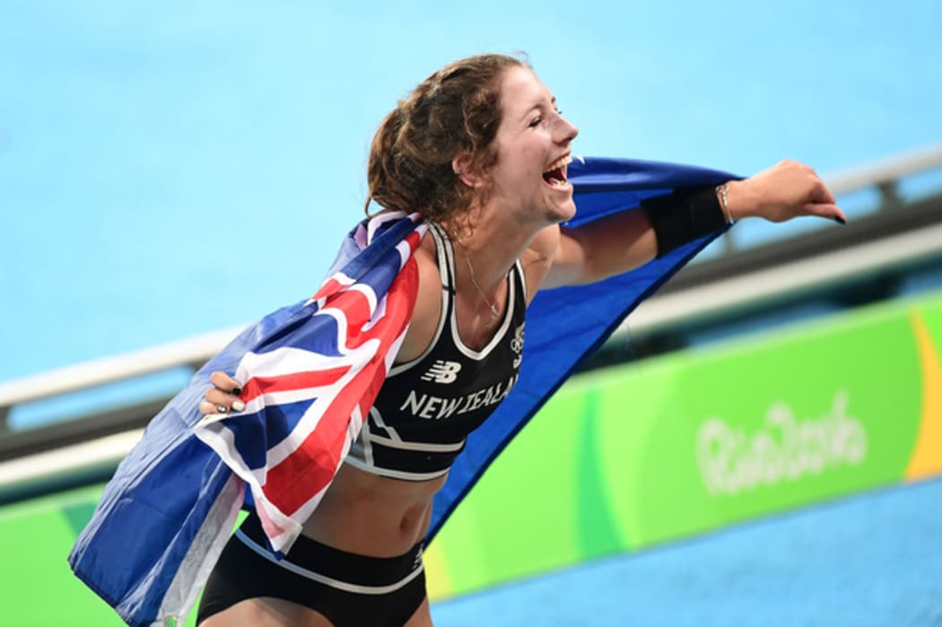 Pole vaulter Eliza McCartney celebrates after winning bronze at the Rio 2016 Olympics.