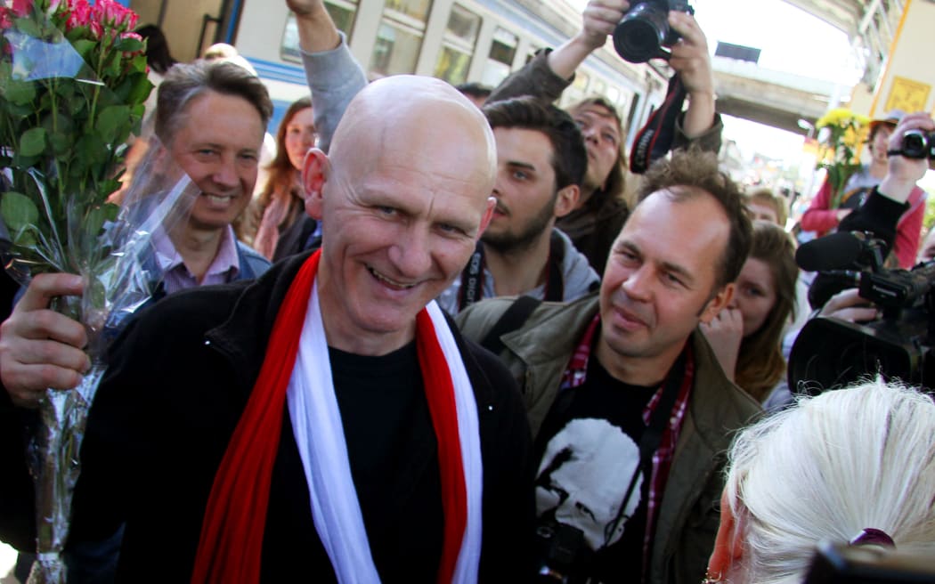 In this file photo taken on 21 June, 2014 Belarus prominent rights activist Ales Byalyatski arrives in the capital Minsk after being released from jail. The Norwegian Nobel Committee awarded the 2022 Nobel Peace Prize to human rights advocate Byalyatski from Belarus, the Russian human rights organisation Memorial and the Ukrainian human rights organisation Center for Civil Liberties.