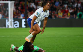 Nigeria's defender Michelle Alozie reacts after being fouled by England's forward Lauren James during the 2023 World Cup.