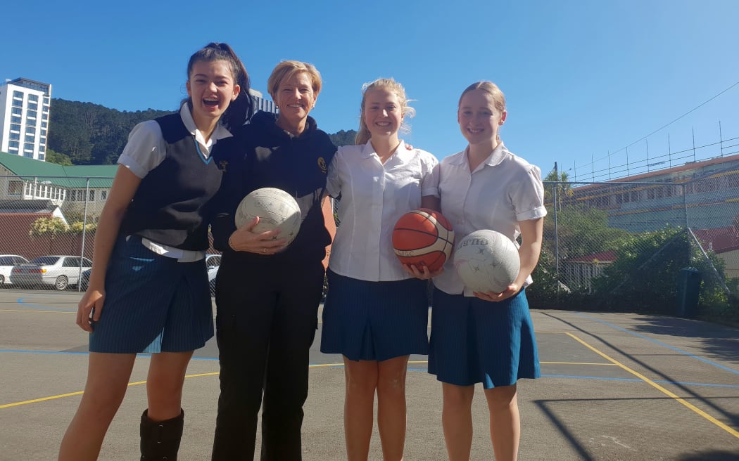 From left, Eve Waititi, college sports director Carolyn Kirkpatrick, Ella Rongen and Unity Crabtree.