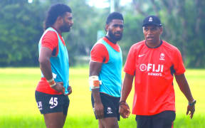 Coach Osea Kolinisau (right) at training with the Fiji men's sevens team. Photo: FRU Media