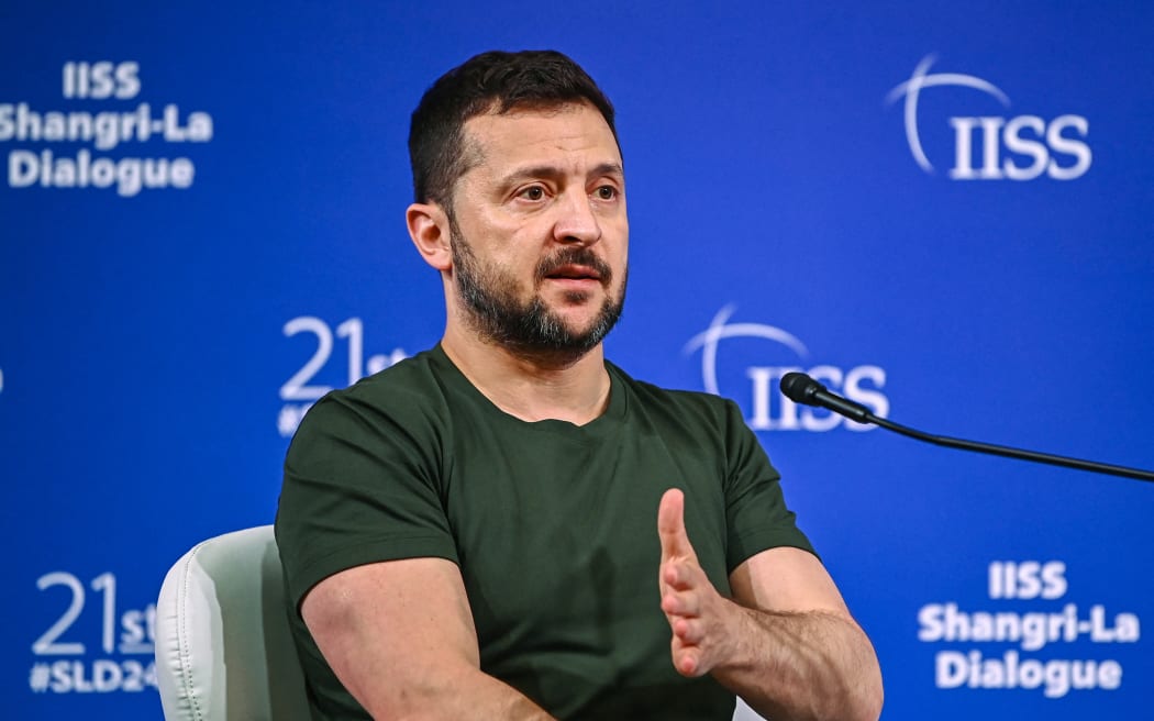 Ukraine's President Volodymyr Zelensky speaks during the 21st Shangri-La Dialogue summit at the Shangri-La Hotel in Singapore on June 2, 2024. (Photo by NHAC NGUYEN / AFP)