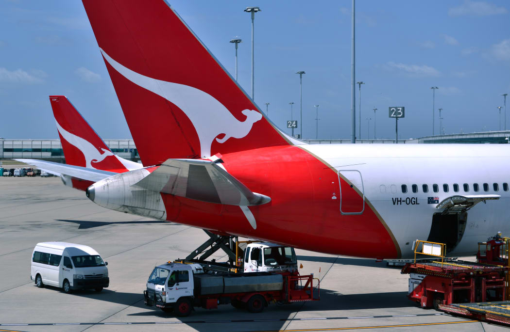 Photo taken on November 17, 2014 shows Qantas planes at Sydney Airport.