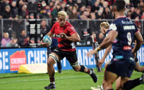 Christian Lio-Willie of the Crusaders runs through to score a try.