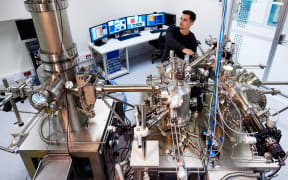 A Silicon Quantum Computer engineer operates one of their Scanning Tunnelling Microscopes to fabricate a quantum processor with atomic precision.