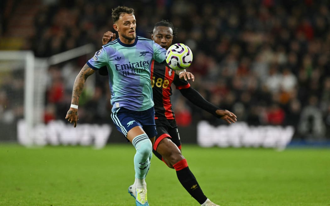 Arsenal's English defender Ben White, left, and Bournemouth's Ghanaian striker Antoine Semenyo compete during the English Premier League football match in Bournemouth.